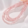 Detailed macro view of cylinder pink crystal beads with natural internal textures - #9 Watermelon Crystal [approximately 28 Beads Per Piece]