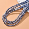 Macro detail of natural blue stone cylinder beads for DIY jewelry making and necklaces - 17# Blue Spot Stone [approximately 28 Stones Per Stone]