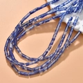 Macro view of blue marble texture cylindrical beads for DIY necklace jewelry making - 22# Blue Lacestone [approximately 28 Beads Per Piece]