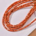 Macro shot of orange and white patterned synthetic stone heishi beads for DIY jewelry - Imperial Turquoise Orange Style (19#)