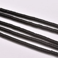 Detailed macro view of glossy black cylindrical beads for DIY retro jewelry making - Black Agate Style (20#)