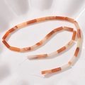 Macro view of cylindrical orange agate stone tube beads for DIY jewelry making - 27# Red Aventurine
