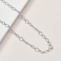 Macro view of silver knotted chain links with twisted texture for jewelry making - 4# Silver Textured Link