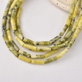 Macro detail of cylinder natural stone beads with yellow green marble textures for DIY jewelry - 34# Grass Yellow Stone