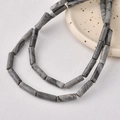 Macro detail of cylindrical marble beads with grey patterns for jewelry making - 36# Map Stone (1 Piece Approximately 28 Stones)