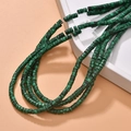 Macro detail of cylinder malachite-pattern synthetic beads for jewelry making projects - Malachite Style (32#)