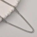 Gros plan d'une chaîne à maillons gourmette argentée polie pour bijoux DIY - 28# Argent Chaîne Plate Gourmette