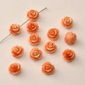 Detailed view of 12mm coral rose flower beads for DIY jewelry making with through-holes - Light Orange Two-Tone