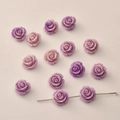Detailed view of 12mm resin rose flower beads showing through-hole for DIY jewelry making - Purple Two-Tone