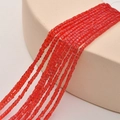 Close-up of 2mm red cube crystal glass beads for DIY jewelry making and crafts - Red