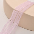 Macro view of 2mm square light purple crystal glass beads with faceted texture for DIY - Pink Jade
