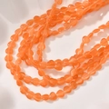 Macro shot of 8mm orange heart-shaped cat eye stone beads for DIY jewelry making - Orange Yellow Cat's Eye