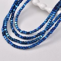 Detailed macro view of 3mm square blue hematite beads with metallic luster for jewelry DIY - Blue Square Pattern