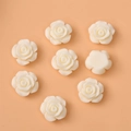 Detailed macro view of 12mm resin rose buds showing layered petals and flat back base - Rose (4#) / 10 Pieces/Pack / Off-white