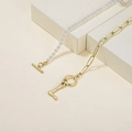 Elegant gold paperclip chain necklace with L letter pendant and pearl toggle strand - Letter L