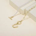 Elegant gold paperclip chain and white pearl necklace with bamboo textured U-pendant - Letter U