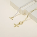 Golden paperclip chain with pearls, OT clasp, and cross pendant necklace for women - Letter X