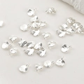 Detalle de colgantes de hojas plateadas irregulares con anillas para crear joyas DIY - Plateado Grueso Pequeño Redondo