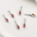 Detailed set of silver vintage pendants with drop-shaped red zircons and retro relief - White Gold Red Zircon Small Lamp Style