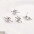Macro detail of 14k gold plated copper ear studs with clear pear shaped zircon stones - White Gold White Zirconia Crystal Light (19.5x11.5mm)
