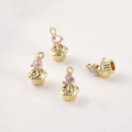 Macro detail of 14k gold plated cupcake charms with pink heart zircon for DIY jewelry - 14k Gold Pink Zircon Heart Cake