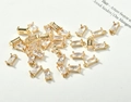 Detailed macro view of 18k gold plated baguette cut crystal glass charms for DIY jewelry - Clear White Rectangle (8.5*4mm)