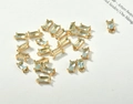 Macro view of rectangular light blue crystal charms with 18k gold plated claw settings - Lake Blue Rectangle (8.5*4mm)