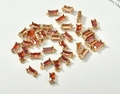 Macro detail of rectangular orange crystal pendants with 18k gold plated DIY connectors - Garnet Red Rectangle (8.5*4mm)