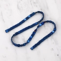 Macro shot of deep blue square hematite beads for DIY jewelry with metallic finish - Blue