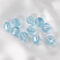 Macro shot of 10 light blue handmade glass beads with silver foil interior on silk - Round Beads / 5 Pieces / Sky Blue