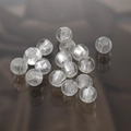Macro shot of clear round glass beads with central drill holes for DIY jewelry making - Round Beads / 5 Pieces / White