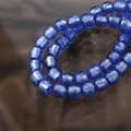 Macro shot of blue glass beads with silver foil texture and reflection on dark surface - Round Beads / 5 Pieces / 15# Blue