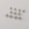Detailed view of silver-plated eye pin bail pearl caps for DIY jewelry making - Silver Small