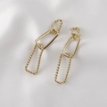 Elegant 14k gold plated rectangular twisted chain earrings on white silk background - Gold