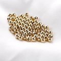 Macro shot of 14K gold-filled spacer beads for jewelry making on white silk background - 14K Gold Style / 2mm (50 Pieces/Pack) / Gold