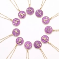 Gouden dierenriem kettingen met paarse glitter hangers en kristallen details - Stier (Goud + Paars)