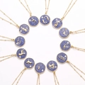 Set van 12 gouden sterrenbeeld kettingen met blauw emaille en fonkelende kristallen ster - Stier (Goud + Blauwgroen)