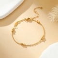 Close-up of gold beaded cross chain with lobster clasp and adjustable extension link - Round Bead Gold Bracelet (B2580-GO)
