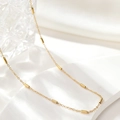 Detailed view of luxury gold bead chain necklace with polished cylindrical accents - Cylindrical Tube Bead Gold Necklace (N2690-GO)
