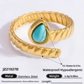 Gold plated stainless steel open ring featuring a teardrop turquoise stone in rope design - Teardrop Turquoise Spiral Style (JZ21027D)