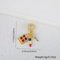 Macro shot of makeup palette and lipstick jewelry charm with dimensions and 3g weight - Makeup Themed Style (Style B)