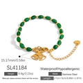 Stainless steel bracelet with green beads and golden double bell pendant charm - Double Bell Green Beaded Bracelet (SL41184)