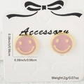 Boucles d'oreilles smiley roses avec bordure dorée et finition huile, 0.98 cm - Rose