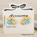 Detail of gold-plated evil eye stud earrings with blue enamel and micro-pave zircons - Evil Eye Half Pave Style (Style 3)