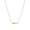 Macro detail of curved cylindrical pendant on a sleek golden snake chain necklace - Minimalist Round Tube Snake Chain Style (N2422-GO)