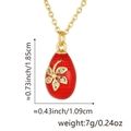 Detail of red enamel egg pendant with gold floral pattern and dimensions 1.85x1.09cm - Red (Style D) / Pendant Only (Without Chain)