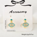 Golden evil eye huggie hoop earrings with light blue enamel and zircon stones - Light Blue Enamel Style