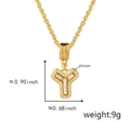 Macro detail of gold-plated Y-letter pendant with zircon stones and dimensions - Gold