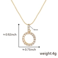Collana con pendente rotondo cavo in zircone placcato oro 18K con dimensioni e peso - O (Solo Ciondolo)