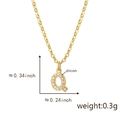 Macro shot of 18K gold letter Q pendant with cubic zirconia and exact dimensions - Golden Q Pendant Only (Without Chain)